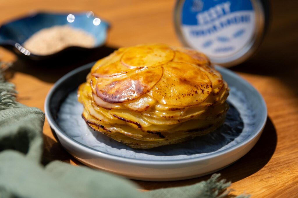 layered potato dish and seasoning