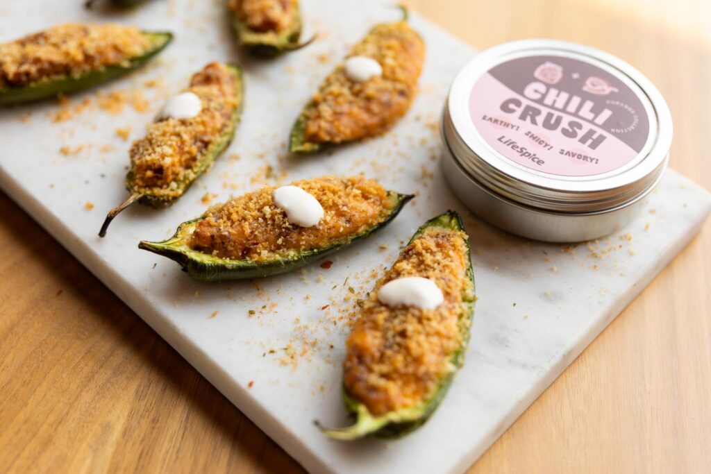 jalapeno peppers and seasoning on a cutting board