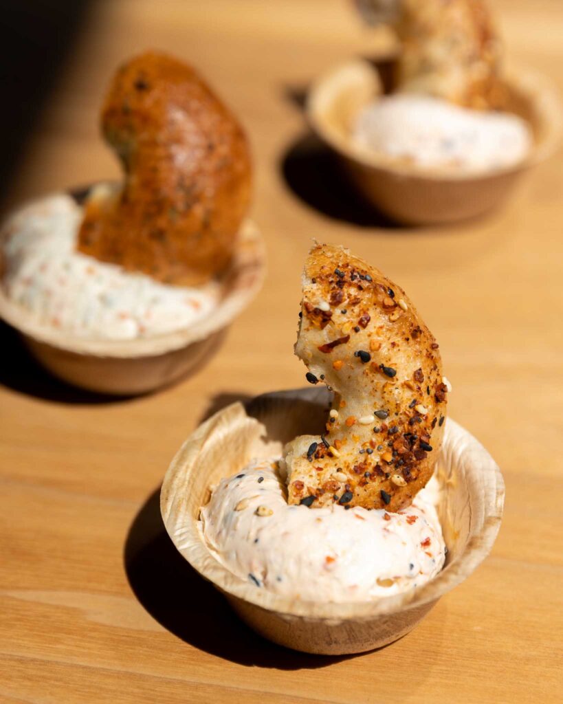 cream cheese in cups with mini bagels