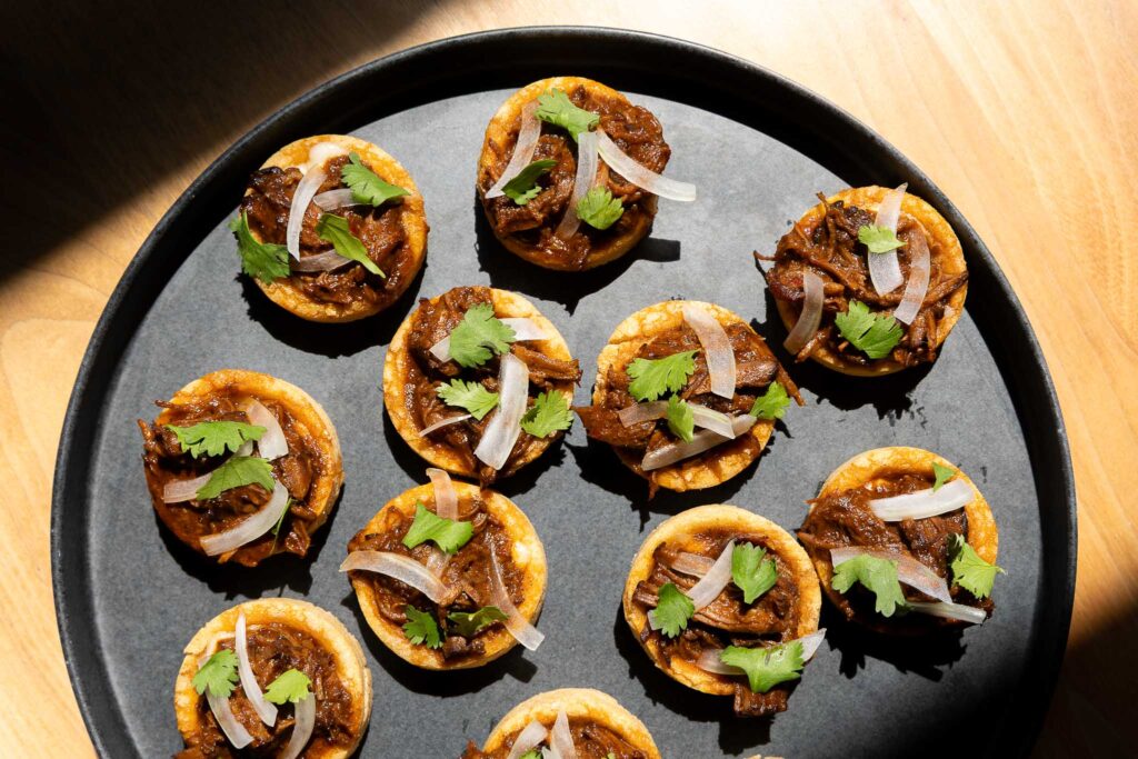Quesabirria Sopes